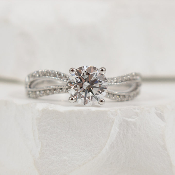 14KW Twisted Split Shank Diamond Engagement Ring  
14K White Gold Roman & Jules Lab Grown & Natural Diamond Twisted Split Shank Engagement Ring
Center - 1.04 Carat Round Brilliant Cut Lab Grown Diamond of VVS2 Clarity, E Colour & Ideal/ Excelle