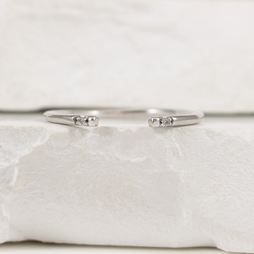 10KW Petite Diamond Open Band
10K White Gold Natural Diamond Open Band
0.01 Total Diamond Weight I1-2 Clarity, H-J Colour
Finger Size 6.5