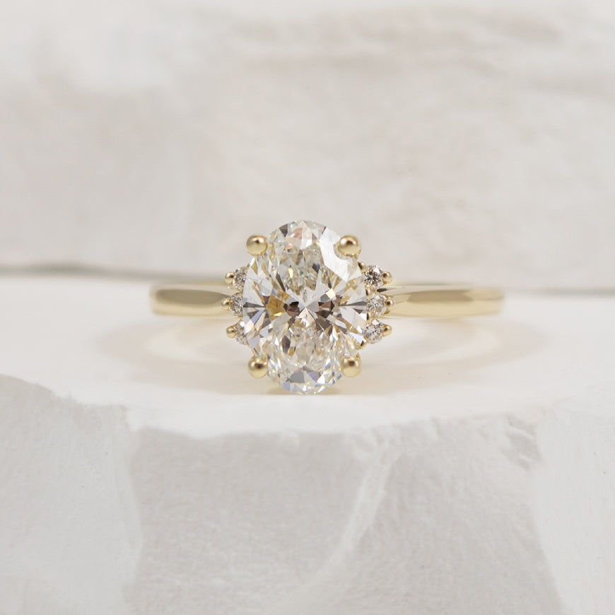 14KY 1.81CT Oval Cut Diamond Engagement Ring      
14K Yellow Gold Oval Lab Grown & Natural Diamond Accented Engagement Ring
Center - 1.81 Carat Oval Cut Lab Grown Diamond of VS1 Clarity, F Colour, Excellent/ Excellent Cut 
Accent - 0.06 Car
