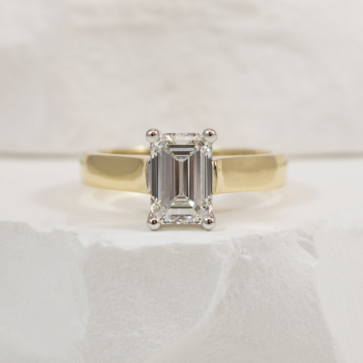 14KY Emerald Cut Diamond Solitaire Engagement Ring
14K Yellow Gold Lab Grown Diamond Solitaire Engagement Ring
Center - 1.51ct Emerald Cut Lab Grown Diamond VS1 Clarity, F Colour, Excellent/ Excellent Cut 
Finger Size