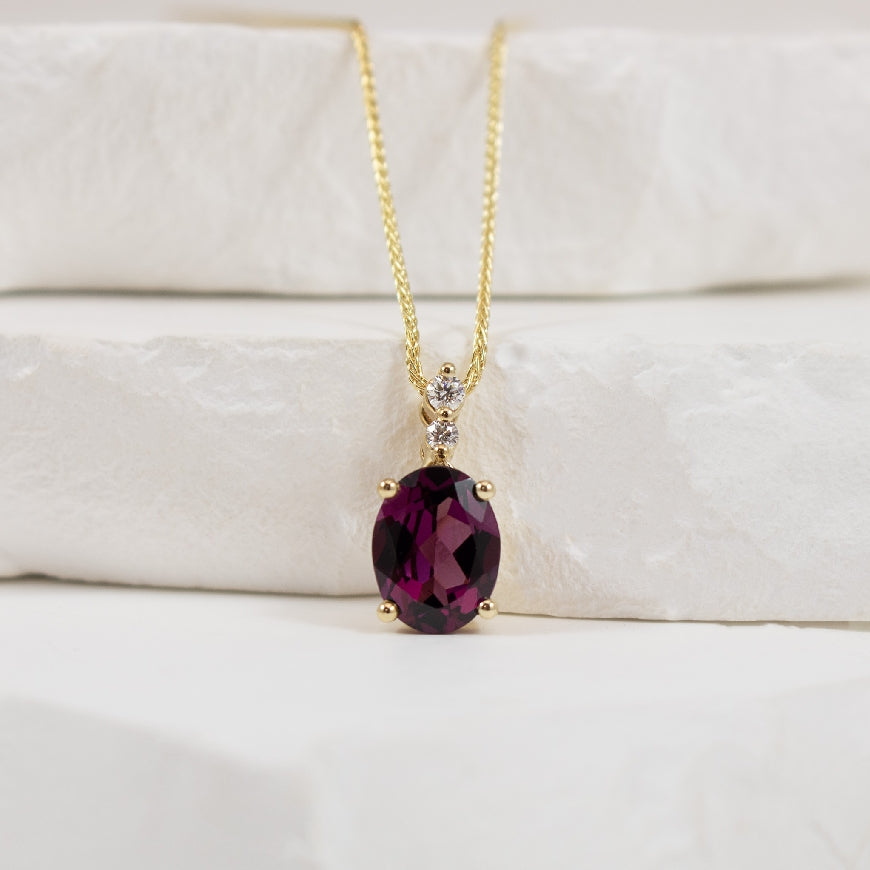 10KY Rhodolite Garnet & Diamond Accented Necklace
10K Yellow Gold Maple Leaf Canadian Natural Diamond & Rhodalite Garnet Necklace
9x7mm Natural Oval Cut Rhodalite Garnet
0.057 Natural Canadian Diamond Weight SI2 Clarity, G Colour
Chai