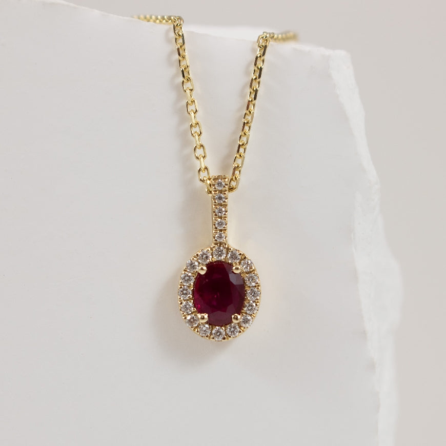 14KY Halo Oval Cut Ruby & Diamond Necklace
14K Yellow Gold Roman & Jules Natural Diamond & Ruby Oval Halo Necklace
0.43 Carat Oval Cut Ruby
0.10 Total Natural Diamond Weight SI1-2 Clarity, G-H Colour
Chain Length 18'