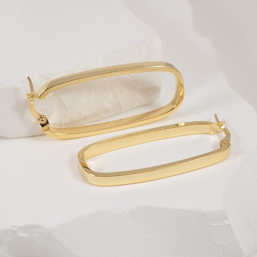 10KY Elongated Cushion Hoop Earrings
10K Yellow Gold Elongated Cushion Hoop Earrings
Earring Closure Hinged Post
2.07 Grams