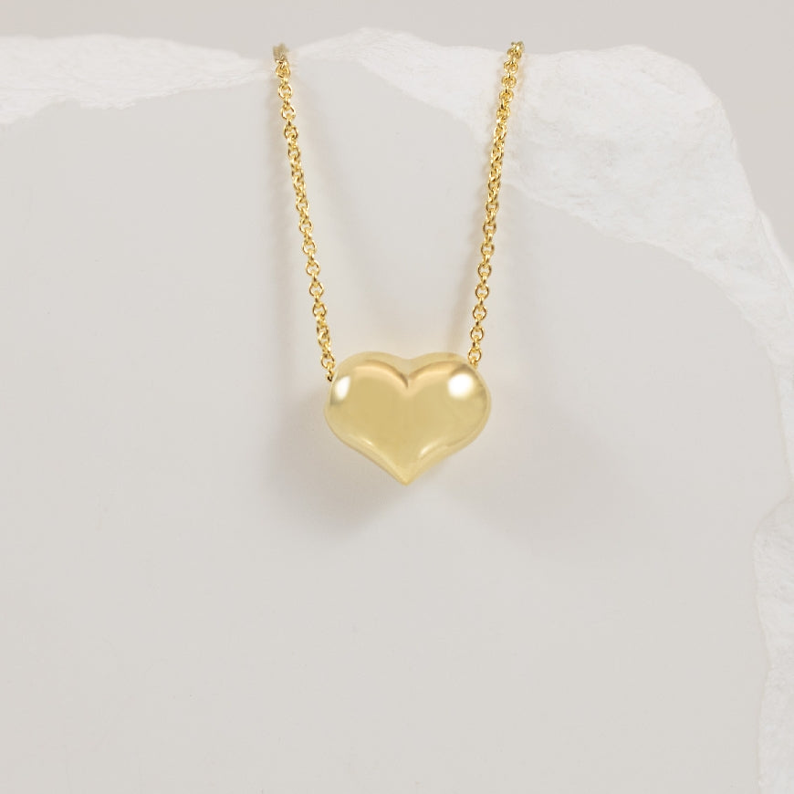 14KY Modern Puffed Heart Necklace
14K Yellow Gold Puffed Heart Necklace
Chain Length 18' (Adjustable)
2.11 Grams