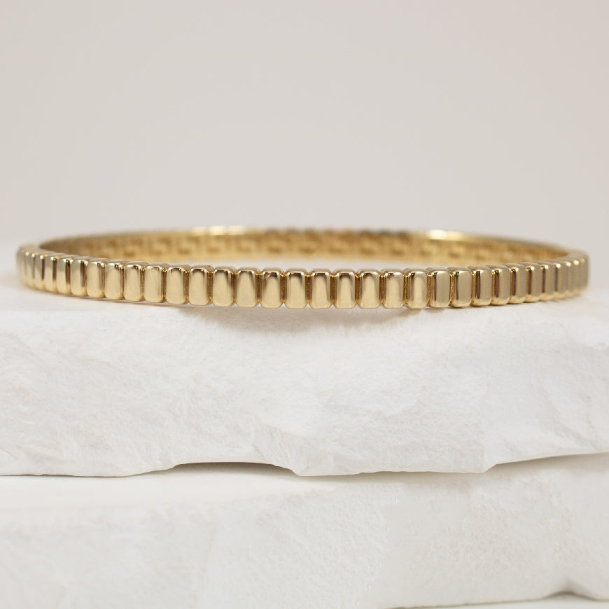 14KY Bold Ribbed Hinged Bangle Bracelet 14.26GR
14K Yellow Gold Ribbed Hinged Bangle
14.26 Grams