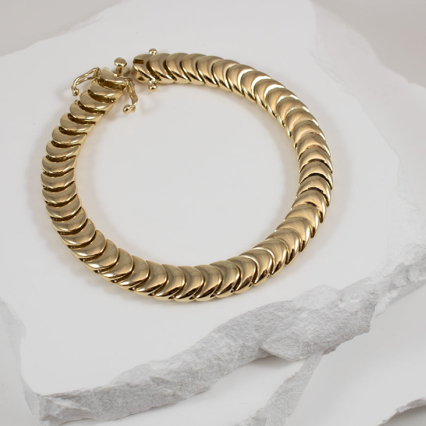 14KY Modern Bold Caterpillar Bracelet 13.44GR
14K Yellow Gold Caterpillar Bracelet
Bracelet Length 7.25'
13.44 Grams