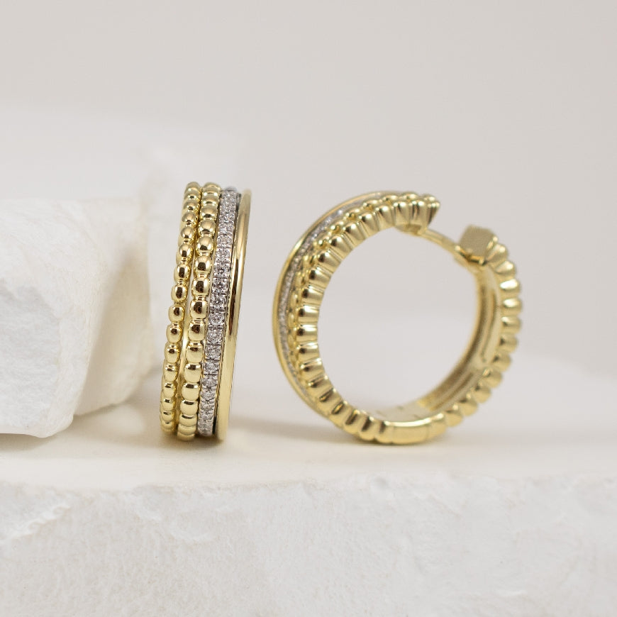 14KY Breuning Diamond Huggie Hoop Earrings
14K Yellow Gold Breuning Natural Diamond Multi-Layer Huggie Hoop Earrings
0.22 Total Natural Diamond Weight SI Clarity, H Colour
Earring Closure Huggie Hoop