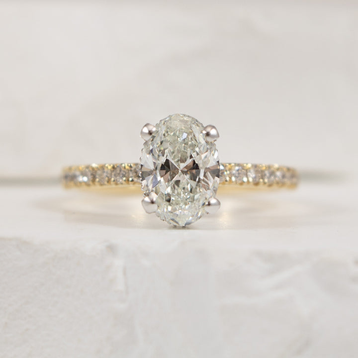 14KY 1.20CT Oval Cut Diamond Engagement Ring      
14K Yellow Gold Oval Cut Hidden Halo Natural Diamond Engagement Ring  
Center - 1.20CT Oval Cut Natural Diamond of SI2 Clarity, H Colour, Excellent/ Very Good Cut, GIA Certified 
Accent - 0.