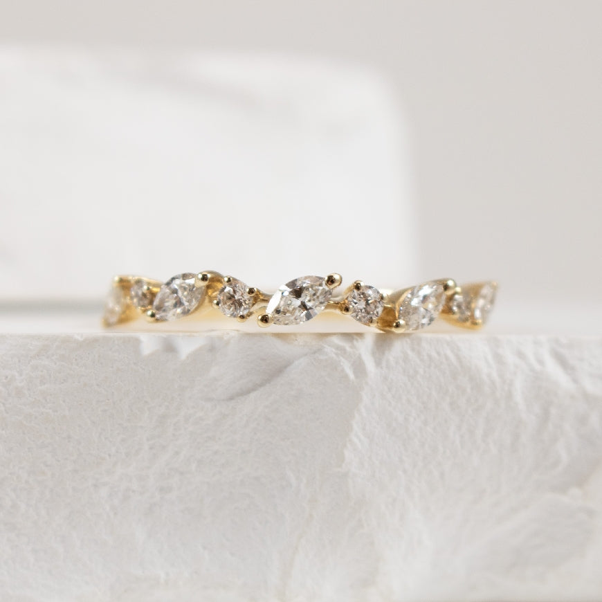 14KY Marquise & Round Brilliant Cut Diamond Band  
14K Yellow Gold Marquise & Round Brilliant Cut Diamond Band 
0.40 Total Diamond Weight SI Clarity, GH Colour 
Finger Size 6.75