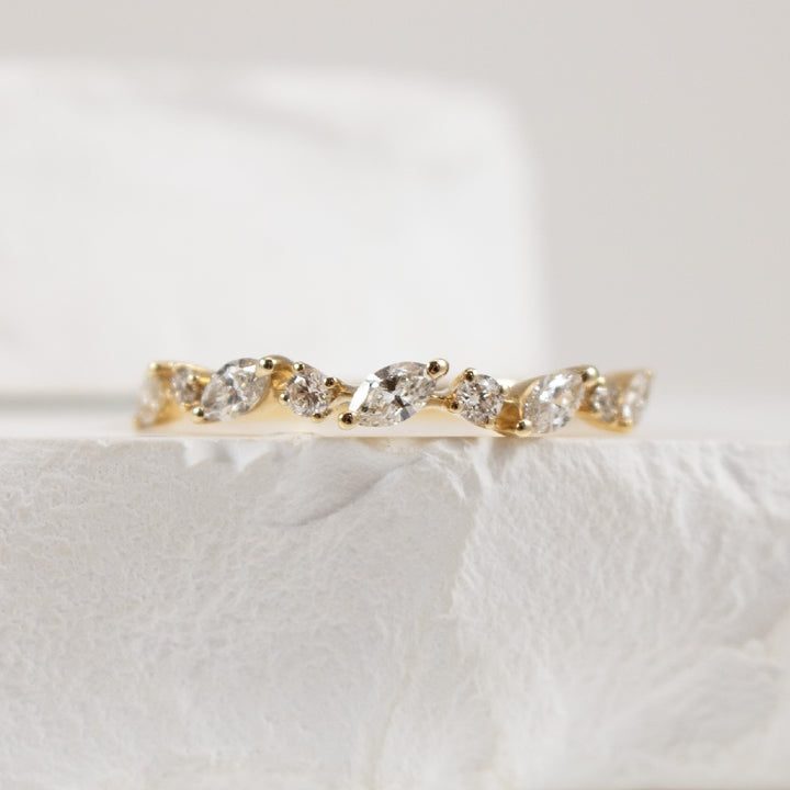 14KY Marquise & Round Brilliant Cut Diamond Band  
14K Yellow Gold Marquise & Round Brilliant Cut Diamond Band 
0.40 Total Diamond Weight SI Clarity, GH Colour 
Finger Size 6.75