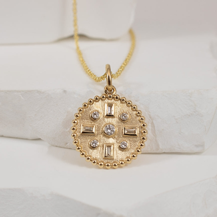 14KY Brushed Gold Diamond Medallion Necklace
14K Yellow Gold Natural Diamond Medallion Necklace
0.23 Total Natural Diamond Weight SI Clarity, GH Colour
Chain Length 18'