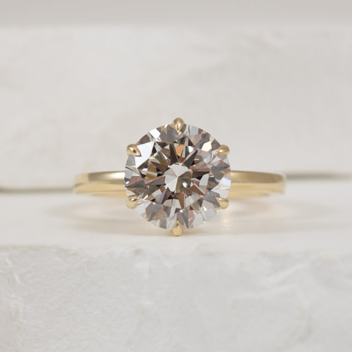 14KY 3.00CT Hidden Halo Diamond Engagement Ring    
14K Yellow Gold Lab Grown & Natural Diamond Hidden Halo Engagement Ring
Center - 3.00CT Round Brilliant Cut Lab Grown Diamond or VS1 Clarity, E Colour, Excellent/ Excellent Cut, IGI Certified