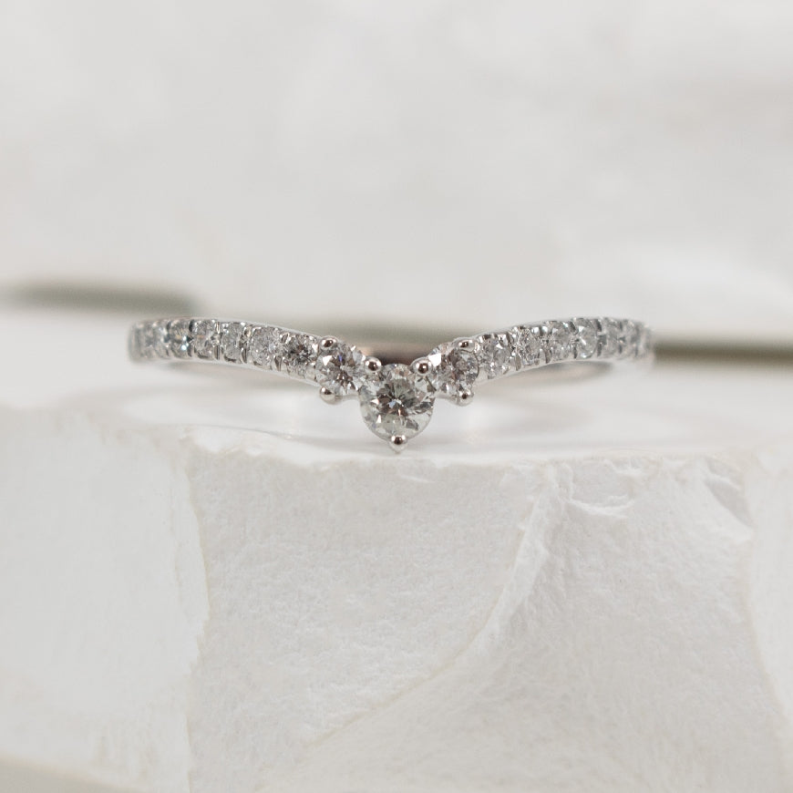 10KW 0.33CT Diamond Chevron Contour Band          
10K White Gold Natural Diamond Chevron Contour Band  
0.33 Total Natural Diamond Weight I2 Clarity, H-J Colour 
Finger Size 6.75