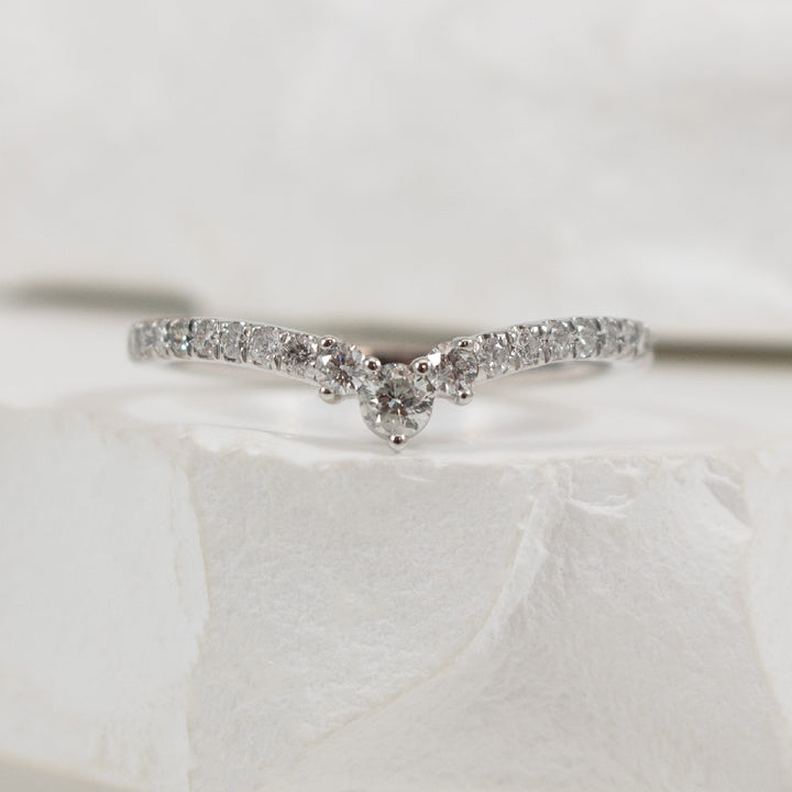 10KW 0.33CT Diamond Chevron Contour Band          
10K White Gold Natural Diamond Chevron Contour Band  
0.33 Total Natural Diamond Weight I2 Clarity, H-J Colour 
Finger Size 6.75