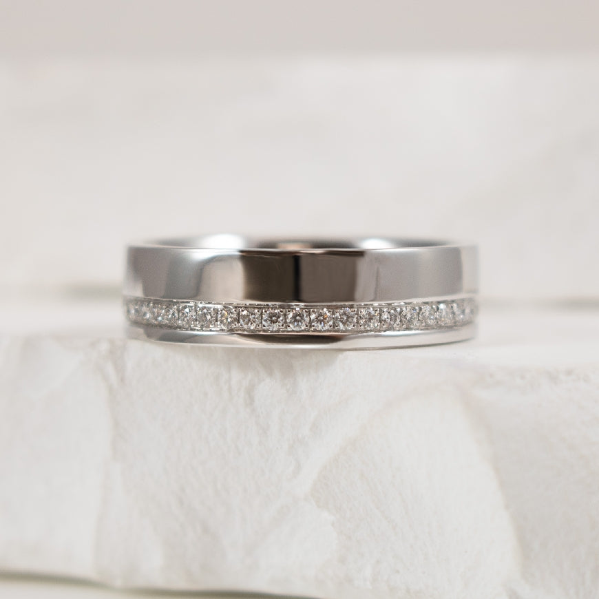 14KW Diamond & High Polish Cigar Band
14K White Gold Natural Diamond & High Polish Cigar Band
0.21 Carats Total Diamond Weight of SI1-2 Clarity, GH Colour
5.35mm Wide
Finger Size 6.5