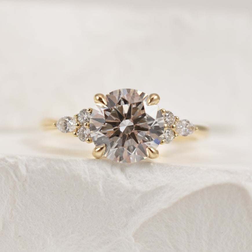 14KY S.Kashi 1.81CT Diamond Engagement Ring                
14K Yellow Gold S.Kashi Round Brilliant & Marquise Cut Lab Grown & Natural Diamond Accented Engagement Ring 
1.81 Carat Round Brilliant Cut Lab Grown Diamond of VS1 Clarity, F Colour,