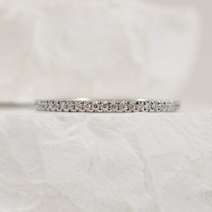 10KW 0.10CT Straight Diamond Band                 
10K White Gold Natural Diamond Band
0.10 Total Natural Diamond Weight I1 Clarity, GHI Colour
Finger Size