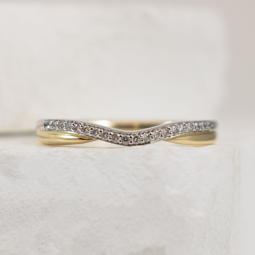 14KY/W Diamond Contour Band             
14K Yellow & White Gold Natural Diamond Contour Band 
0.25 Total Diamond Weight I1/2 Clarity, HIJ Colour 
Finger Size 6.5