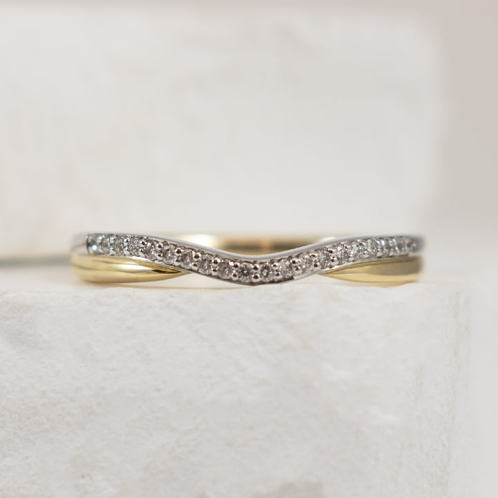 14KY/W Diamond Contour Band             
14K Yellow & White Gold Natural Diamond Contour Band 
0.25 Total Diamond Weight I1/2 Clarity, HIJ Colour 
Finger Size 6.5