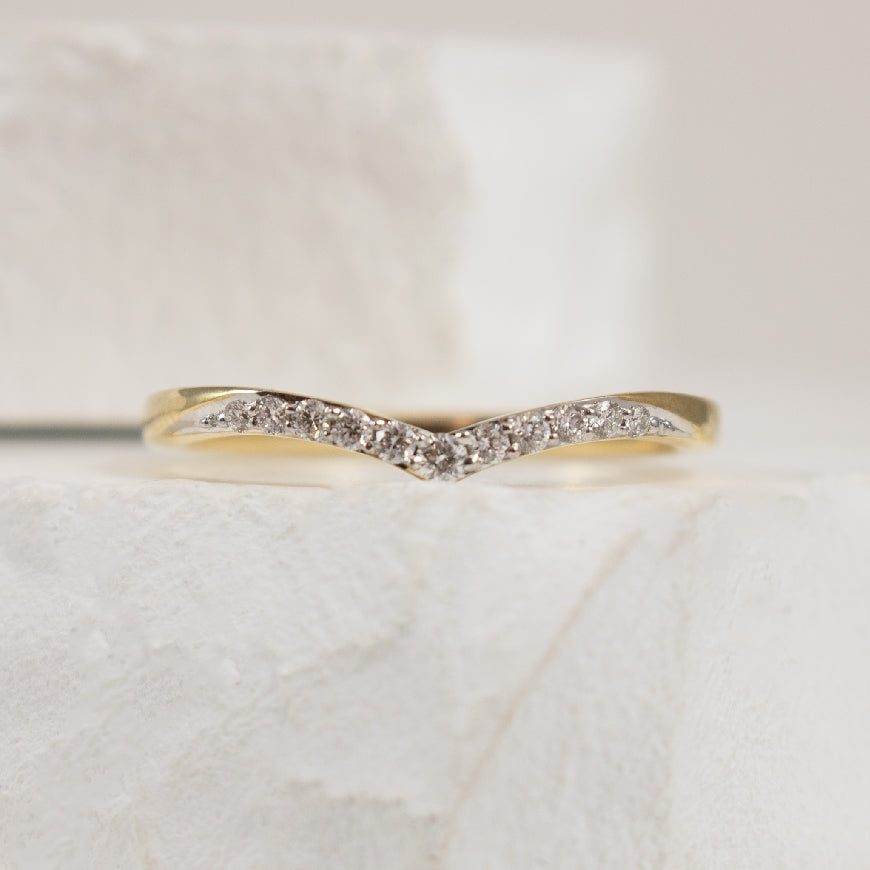 10KY Soft Contour Diamond Chevron Band                
10K Yellow Gold Natural Diamond Chevron Band 
0.12 Total Diamond Weight I2 Clarity, HIJ Colour 
Finger Size 6.75