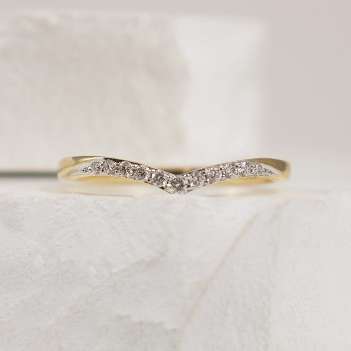 10KY Soft Contour Diamond Chevron Band                
10K Yellow Gold Natural Diamond Chevron Band 
0.12 Total Diamond Weight I2 Clarity, HIJ Colour 
Finger Size 6.75