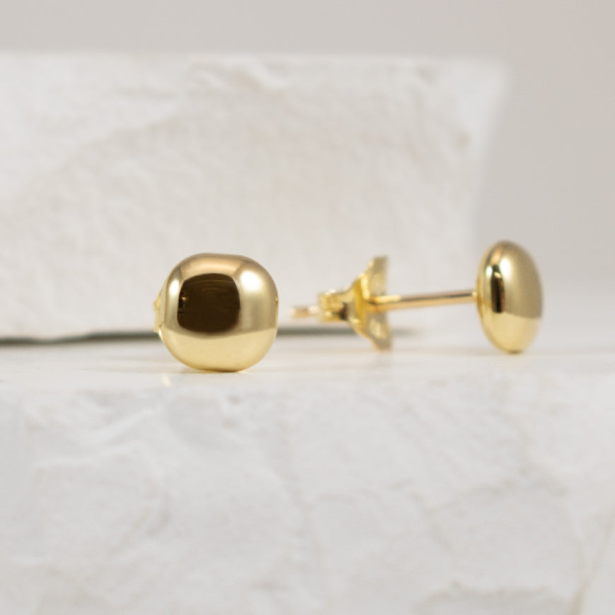 14KY Puffed Cushion Shaped Stud Earrings
14K Yellow Gold Puffed Cushion Shaped Polished Stud Earrings
0.84 Grams