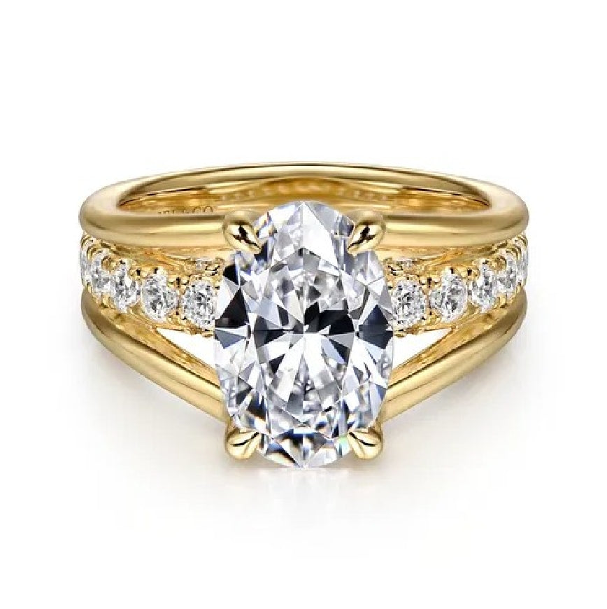 14KY Gabriel & Co. Diamond Engagement Ring           

14 Karat Yellow Gold Gabriel & Co. Lab Grown & Natural Diamond Accented Split Shank Engagement Ring 

Center - 2.02 Carat Oval Cut Lab Grown Diamond of VS1 Clarity, E Colour, Excellent/ Excel