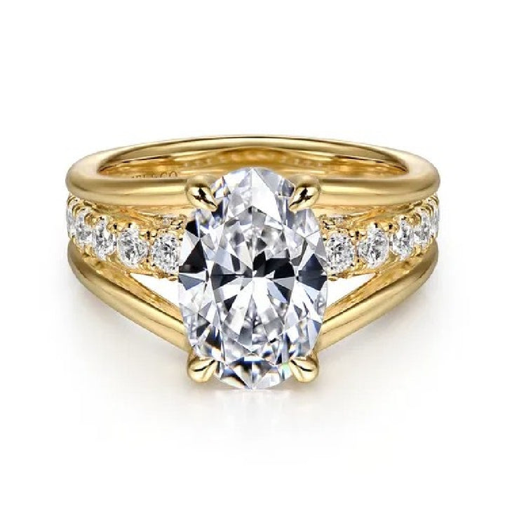 14KY Gabriel & Co. Diamond Engagement Ring           

14 Karat Yellow Gold Gabriel & Co. Lab Grown & Natural Diamond Accented Split Shank Engagement Ring 

Center - 2.02 Carat Oval Cut Lab Grown Diamond of VS1 Clarity, E Colour, Excellent/ Excel