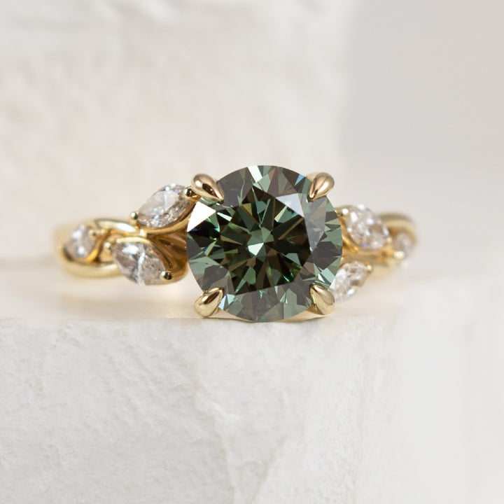 14KY Gabriel & Co. Diamond Engagement Ring           

14 Karat Yellow Gold Gabriel & Co. Fancy Vivid Green Lab Grown & Natural Diamond Vine Engagement Ring 

Center - 2.01 Carat Round Brilliant Cut Lab Grown Diamond of VVS2 Clarity, Fancy Vivid 