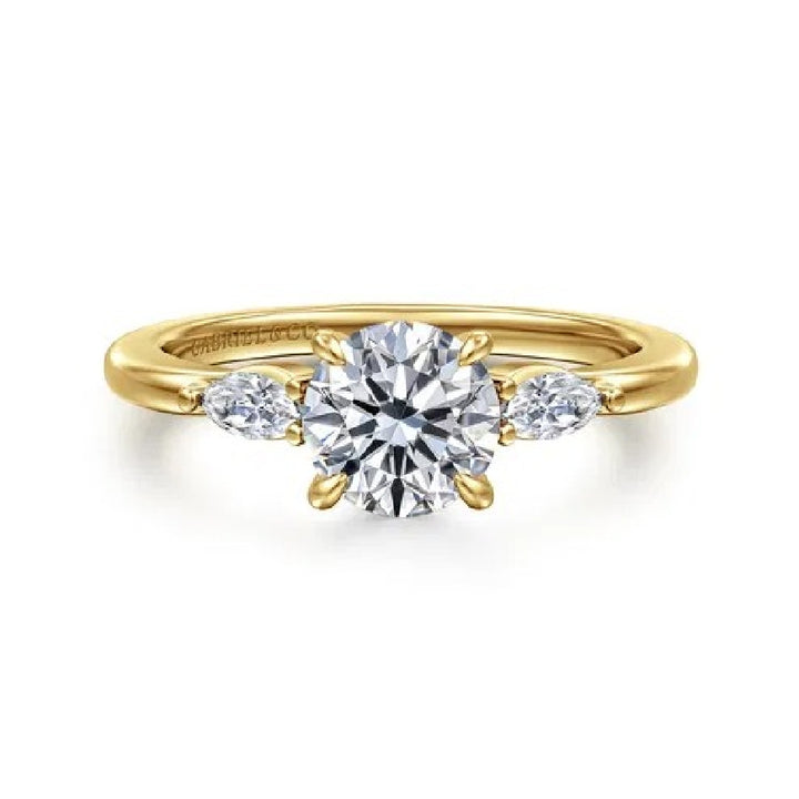 14KY Gabriel & Co. Diamond Engagement Ring           

14 Karat Yellow Gold Gabriel & Co. Round Brilliant & Marquise Cut Threestone Engagement Ring 

Center - 1.00 Carat Round Brilliant Cut Lab Grown Diamond of VVS2 Clarity, E Colour, Excellent, 