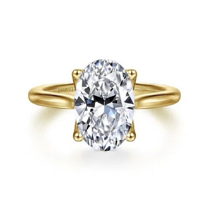 14KY Gabriel & Co. Diamond Engagement Ring           

14 Karat Yellow Gold Gabriel & Co. Lab Grown & Natural Diamond Engagement Ring 

Center - 3.05 Carat Oval Cut Lab Grown Diamond of VS1 Clarity, E Colour, Excellent/ Excellent Cut, IGI Certifi