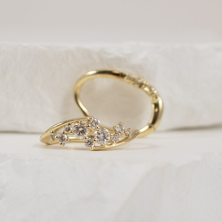 10KY Abstract Floating Diamond Hoop Earrings      

10K Yellow Gold Natural Diamond Hoop Earrings 

0.50 Total Natural Diamond Weight I1 Clarity, J-L Colour 

Earring Closure Huggie Hoop

