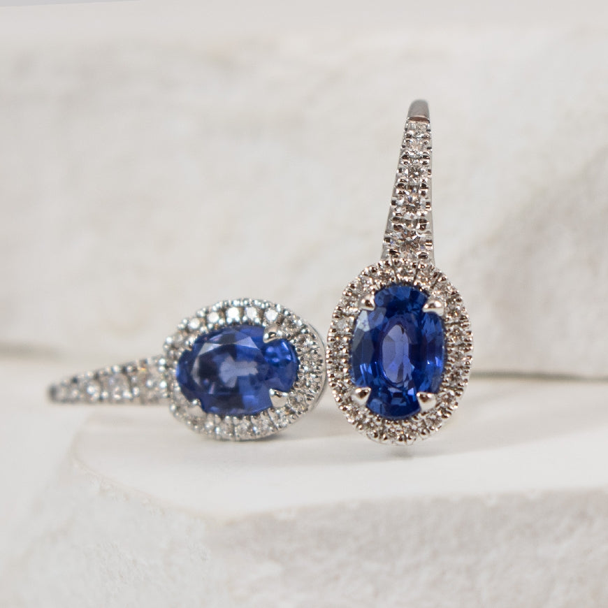 18KW Oval Sapphire & Diamond Drop Earrings          

18K White Gold Oval Cut Natural Sapphire & Diamond Drop Earrings

1.25 Carats Total Sapphire Weight

0.19 Total Diamond Weight SI Clarity, GH Colour 

Earring Closure Leverbacks 