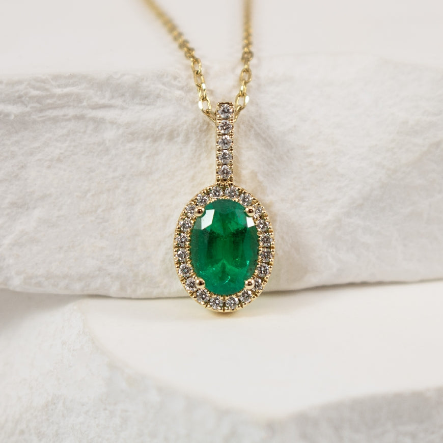 14KY Emerald & Diamond Halo Necklace

14K Yellow Gold Natural Diamond & Emerald Halo Necklace

0.71 Carat Oval Cut Ruby

0.12 Total Diamond Weight SI Clarity, GH Colour 

18' Chain Length