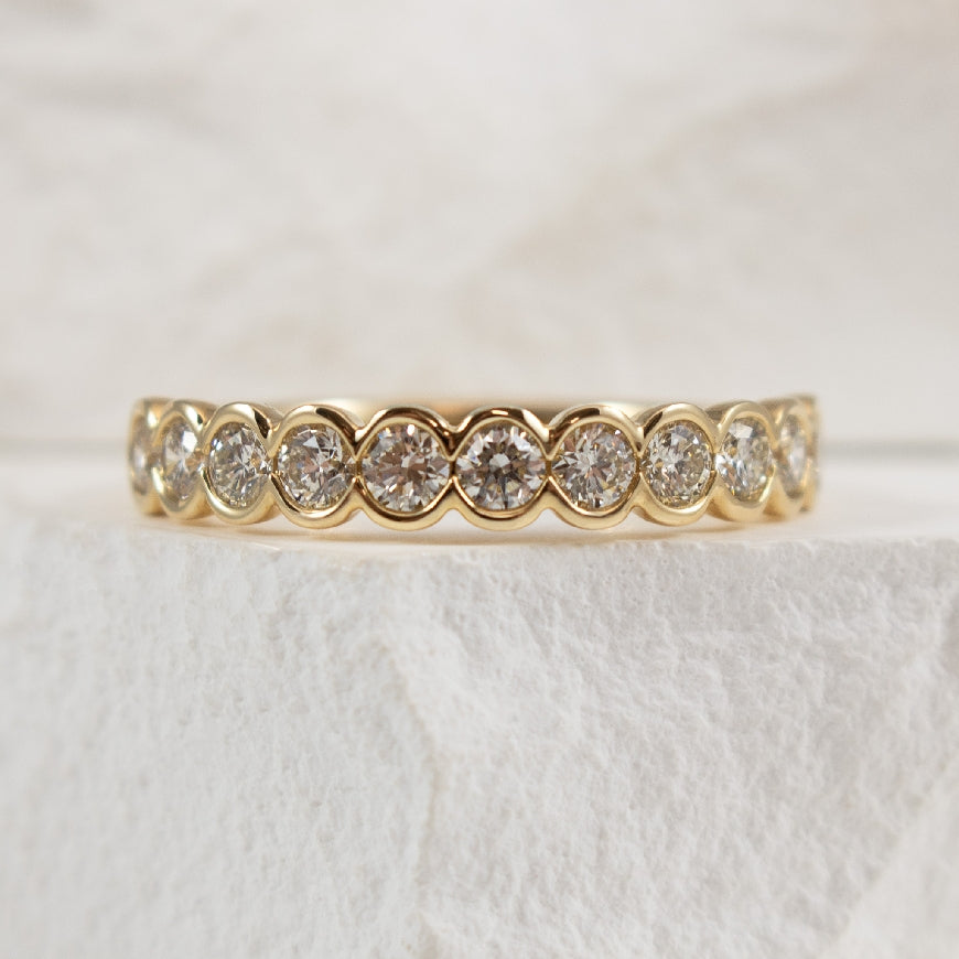 14KY Diamond Half Bezel Band

14K Yellow Gold Half Bezel Natural Diamond Band 

0.75 Carat Total Diamond Weight 

Finger Size 6.5