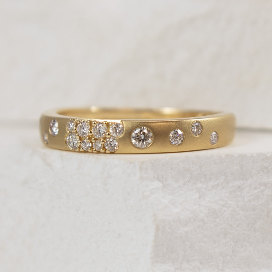 14KY Abstract Scattered Diamond Band

14K Yellow Gold Abstract Scattered Diamond Brushed Finish Band  

0.21 Carat Total Diamond Weight 

Finger Size 6.5