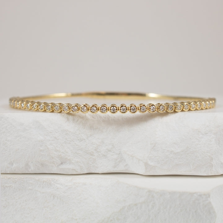 14KY Diamond Bezel Style Flex Bangle 

14 Karat Yellow Gold Natural Diamond Bezel Style Flexiable Bangle Bracelet 

0.56 Carats Total Natural Diamond Weight of SI2-I1 Clarity, HI Colour 

6.75' Bracelet Length 



