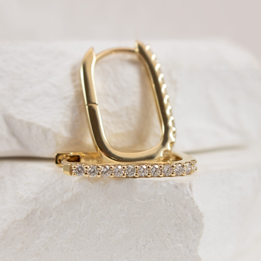 14KY Oblong Diamond Hoop Earrings

14 Karat Yellow Gold Natural Diamond Oblong Hoop Earrings

0.35 Carats Total Natural Diamond Weight of SI2-I1 Clarity, HI Colour 

16mm 

Earring Closure - Huggie Style 

