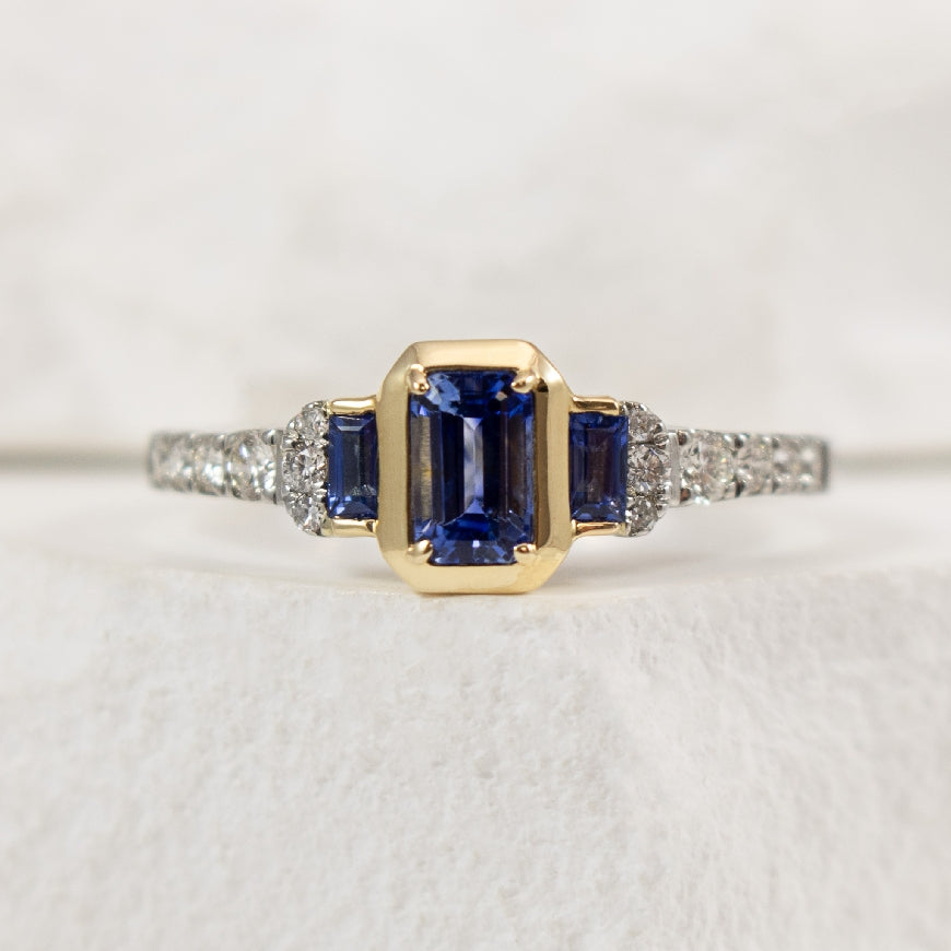 Platinum & 14K Yellow Gold Sapphire and Diamond Three Stone Emerald Cut Ring