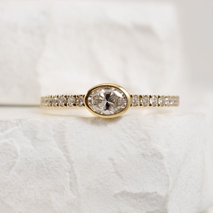 14KY East West Bezel Set Oval Ring

14K Yellow Gold Oval Cut East West Bezel Set Diamond Accented Ring

0.50 Total Natural Diamond Weight of SI2-I1 Clarity, IJ Colour

Finger Size 6.5
