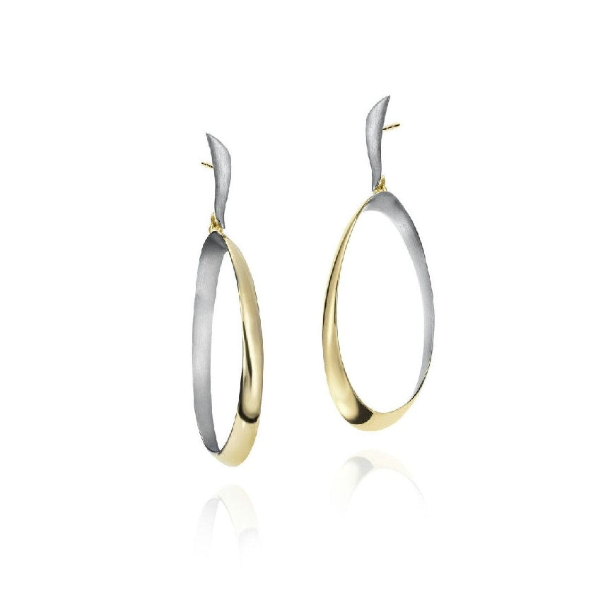 SS/18KY Jorge Revilla 'Bubble' Earrings

Sterling Silver & 18K Yellow Gold Plated Jorge Revilla Two Tone 'Bubble' Drop Hoop Earrings 

Earring Closure Post with Butterfly Back
