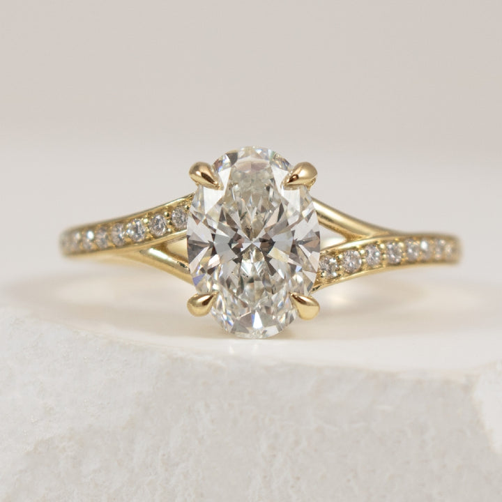 14KY 1.54CT Diamond Oval Cut Engagement Ring      

14K Yellow Gold Lab Grown Diamond Oval Split Shank Engagement Ring 

Center - 1.54 Carat Oval Cut Lab Grown Diamond of VS1 Clarity, E Colour, Excellent/ Excellent Cut 

Accent - 0.20 Total Lab