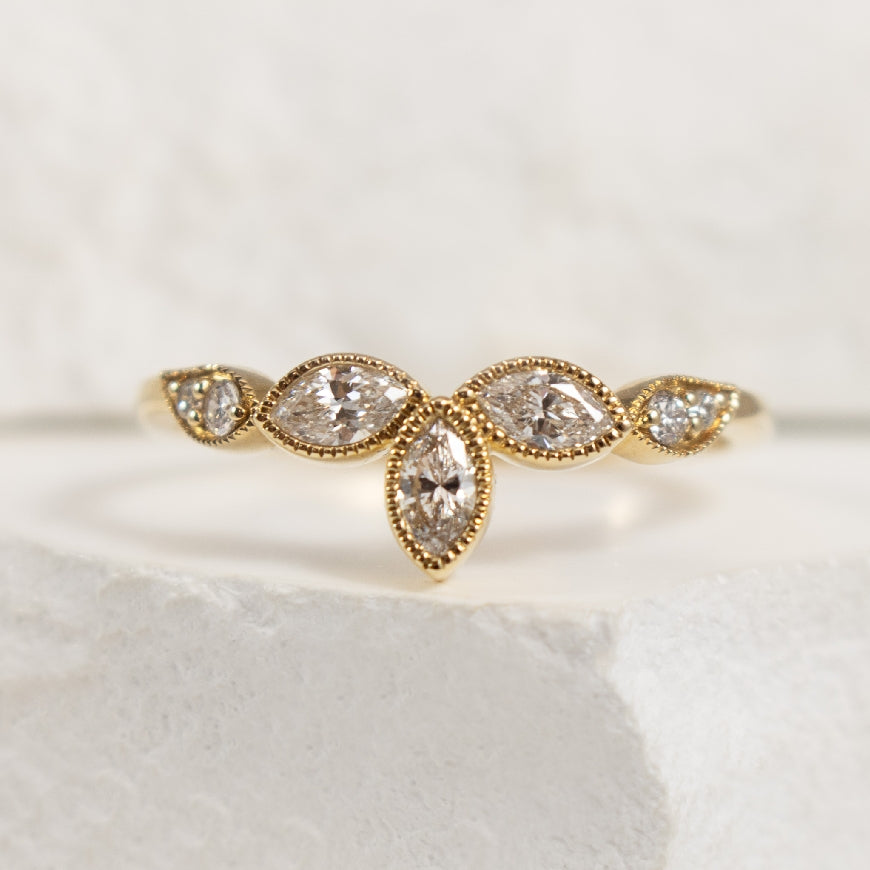 14KY Marquise Diamond Chevron Band

14K Yellow Gold Milgrain Marquise Diamond Chevron Band

0.25 Total Natural Diamond Weight of 

Finger Size 6.5


