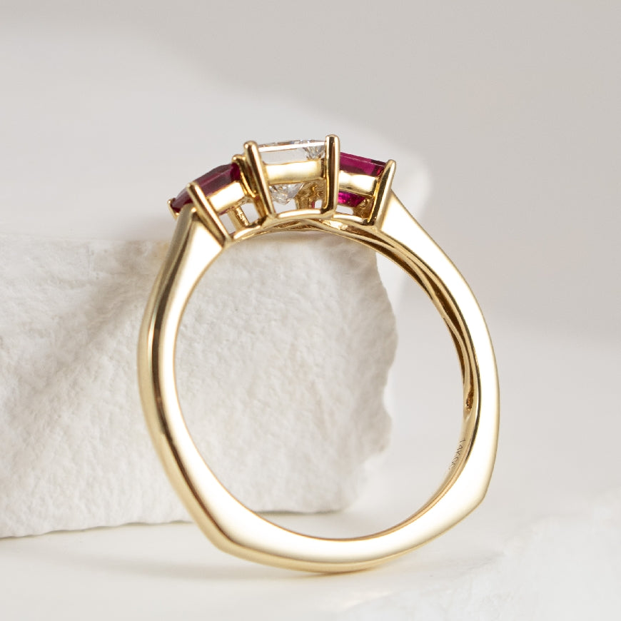 14K Yellow Gold Ruby & Lab Grown Diamond Three Stone Princess Cut Ring, Diamond Center with Ruby Side Stones - Side Profile/2