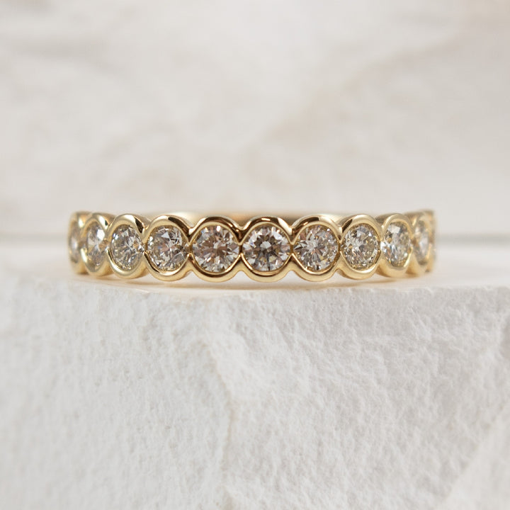 14KY Diamond Half Bezel Band

14K Yellow Gold Half Bezel Natural Diamond Band 

0.75 Carat Total Diamond Weight 

Finger Size 6.5