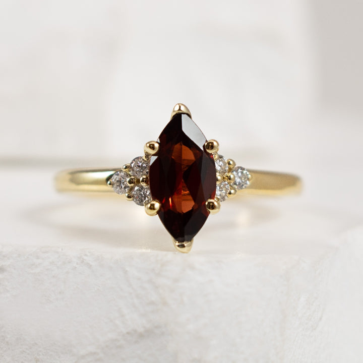 10KY Garnet & Canadian Diamond Marquise Ring

10 Karat Yellow Gold Marquise Cut Garnet & Canadian Maple Leaf Diamond Ring  

10x5mm Marquise Cut Garnet 

0.13 Carat Total Natural Diamond Weight of SI2 Clarity, H Colour

Finger Size 6.5