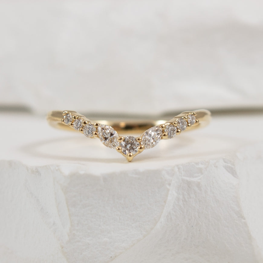 14KY Marquise & Round Cut Diamond Chevron Band    

14K Yellow Gold Natural Diamond Chevron Contour Band 

0.20 Carats Round Brilliant & Marquise Cut Diamonds of SI2-SI3 Clarity, G-H Colour 

Finger Size 7
