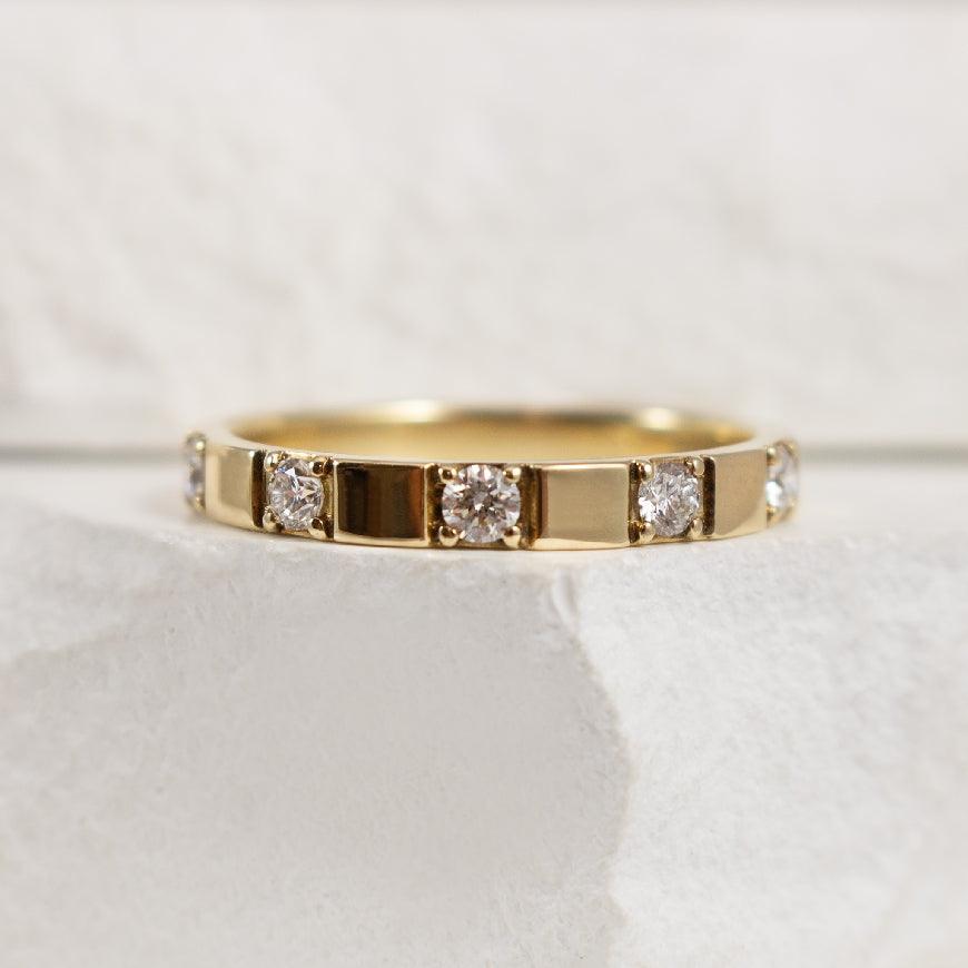 10KY Canadian Diamond & Gold Bar Band                    

10K Yellow Gold Canadian Natural Diamond & Gold Bar Band

0.25ct Total Natural Diamond Weight SI2 Clarity, F Colour 

Finger Size 6.5
