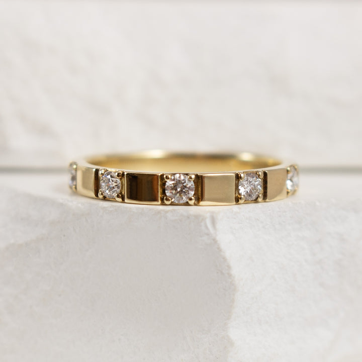 10KY Canadian Diamond & Gold Bar Band                    

10K Yellow Gold Canadian Natural Diamond & Gold Bar Band

0.25ct Total Natural Diamond Weight SI2 Clarity, F Colour 

Finger Size 6.5
