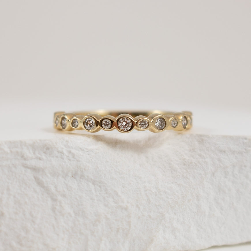 14KY Round Brilliant Cut Diamond Bezel Set Band   

14K Yellow Gold Natural Diamond Bezel Set Band 

0.24 Total Round Brilliant Cut Diamond Weight of SI Clarity, G Colour

Finger Size 

